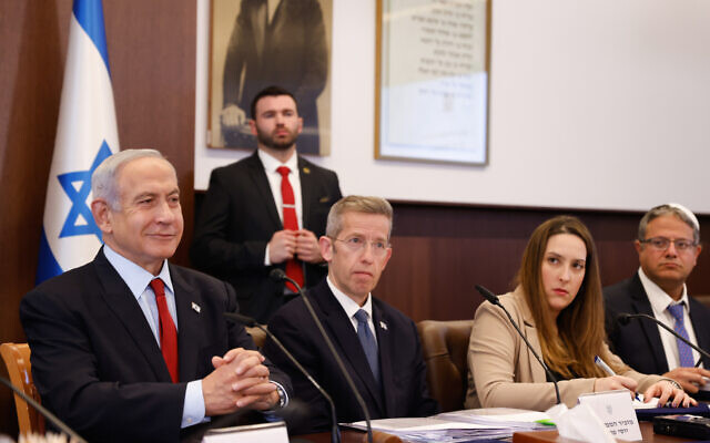 Prime Minister Benjamin Netanyahu (left) leads the weekly cabinet meeting at his office in Jerusalem on January 22, 2023. (Olivier Fitoussi/Flash90) Prime Minister Benjamin Netanyahu (left) leads the weekly cabinet meeting at his office in Jerusalem on January 22, 2023. (Olivier Fitoussi/Flash90)