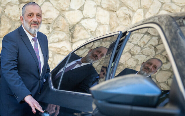 Shas leader Aryeh Deri outside his home in Jerusalem on January 22, 2023. (Yonatan Sindel/Flash90)
