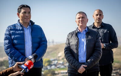 Likud MK's Yuli Edelstein and Danny Danon visit the Bedouin village Khan al-Ahmar, in the West Bank on January 23, 2023. (Yonatan Sindel/Flash90)