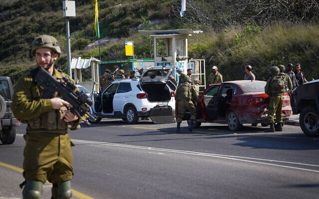 Israeli security forces inspect the scene of an attempted stabbing attack, near Kedumim, in the West Bank, on January 25, 2023. (Hillel Maeir/Flash90) Israeli security forces inspect the scene of an attempted stabbing attack, near Kedumim, in the West Bank, on January 25, 2023. (Hillel Maeir/Flash90)