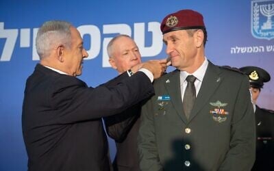 Prime Minister Benjamin Netanyahu and Defense Minister Yoav Gallant award incoming IDF chief Herzi Halevi with the rank of lieutenant general at the Prime Minister's Office in Jerusalem, January 16, 2023. (Israel Defense Forces) Prime Minister Benjamin Netanyahu and Defense Minister Yoav Gallant award incoming IDF chief Herzi Halevi with the rank of lieutenant general at the Prime Minister's Office in Jerusalem, January 16, 2023. (Israel Defense Forces)