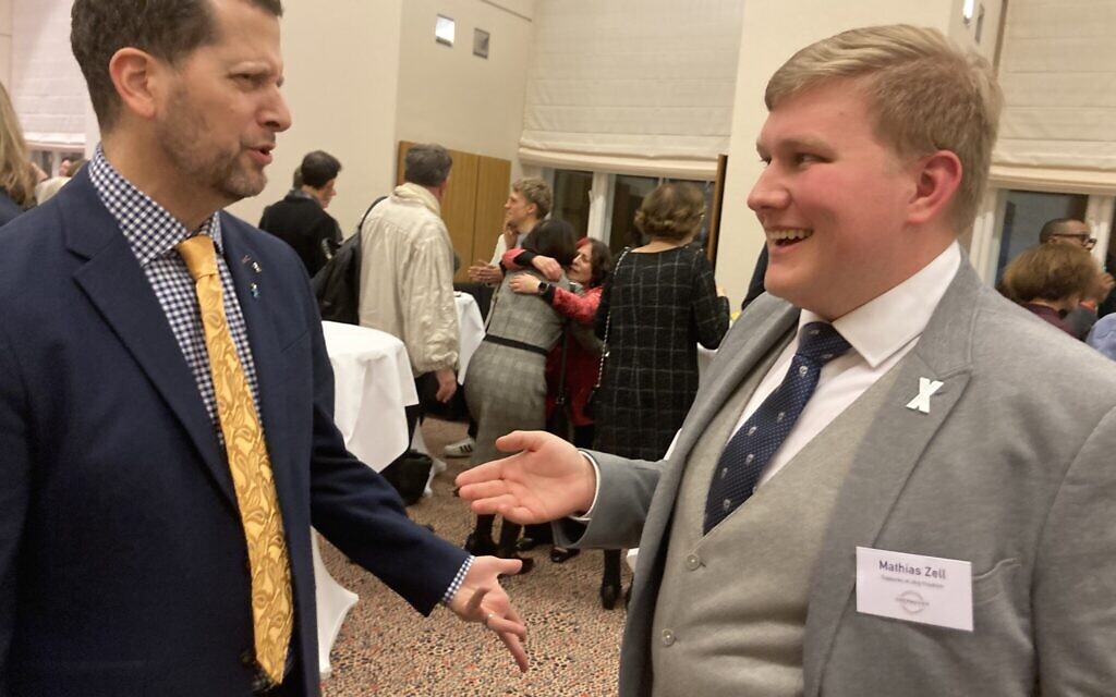 Joel Obermayer, left, with student Mathias Zell, who nominated his former teacher Jörg Friedrich for an Obermayer Award, January 25, 2023. (Toby Axelrod)