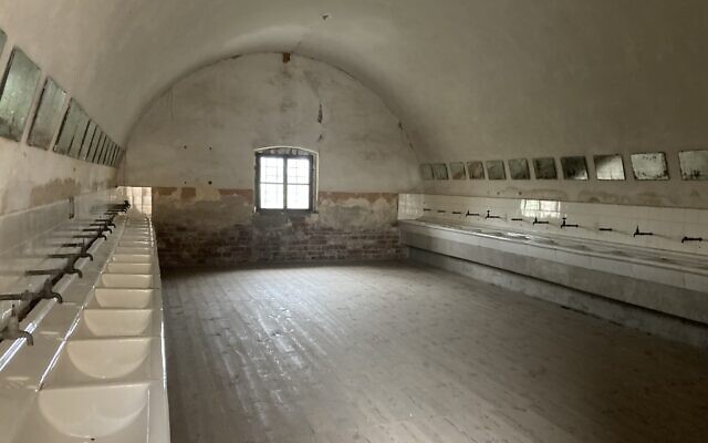A bathroom in the former Theresienstadt ghetto-concentration camp, pictured on January 24, 2023. (Yaakov Schwartz/ Times of Israel)
