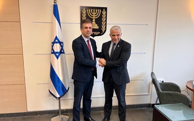 File: Incoming Foreign Minister Eli Cohen, left, and his predecessor Yair Lapid meet for a handover meeting at the Foreign Ministry in Jerusalem, January 2, 2023. (Foreign Ministry) File: Incoming Foreign Minister Eli Cohen, left, and his predecessor Yair Lapid meet for a handover meeting at the Foreign Ministry in Jerusalem, January 2, 2023. (Foreign Ministry)