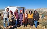 Otzma Yedudit MK Limor Son Har-Melech (3R) poses with activists who set up an illegal outpost in the West Bank on January 20, 2023 (Courtesy)