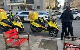 A handout photo shows Magen David Adom paramedics at the scene of a stabbing in the central coastal city of Bat Yam, January 7, 2023. (Magen David Adom)