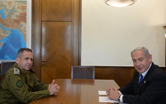 Outgoing IDF chief Aviv Kohavi (left) meets with Prime Minister Benjamin Netanyahu in Jerusalem on January 15, 2023. (Amos Ben Gershom/GPO) Outgoing IDF chief Aviv Kohavi (left) meets with Prime Minister Benjamin Netanyahu in Jerusalem on January 15, 2023. (Amos Ben Gershom/GPO)