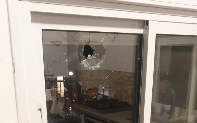 Damage to the window of a home in the West Bank settlement of Shaked is seen, following a shooting attack, January 16, 2023. (Samaria Regional Council) Damage to the window of a home in the West Bank settlement of Shaked is seen, following a shooting attack, January 16, 2023. (Samaria Regional Council)