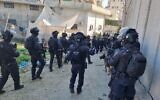 Police officers enter the Shuafat refugee camp to demolish the home of a Palestinian gunman, January 25, 2023. (Israel Police)