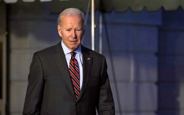 US President Joe Biden walks out of the White House in Washington, January 27, 2023. (AP Photo/Susan Walsh) US President Joe Biden walks out of the White House in Washington, January 27, 2023. (AP Photo/Susan Walsh)