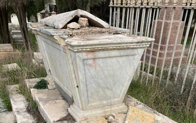 Damaged tombstones at the Protestant Mount Zion Cemetery, in Jerusalem, January 3, 2022. (Israel Police)