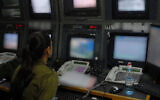 Illustrative: An Israeli soldier operates surveillance cameras in an undated photo. (Israel Defense Forces)