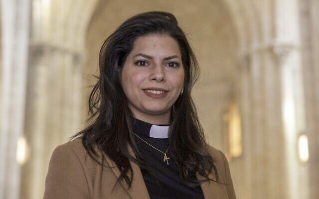 Sally Ibrahim Azar, the first female pastor in the Holy Land of the Lutheran Church, poses for a picture at the Lutheran Church in the Jerusalem's Old City, on January 25, 2023. (Photo by MENAHEM KAHANA / AFP) Sally Ibrahim Azar, the first female pastor in the Holy Land of the Lutheran Church, poses for a picture at the Lutheran Church in the Jerusalem's Old City, on January 25, 2023. (Photo by MENAHEM KAHANA / AFP)