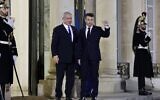 France's President Emmanuel Macron, right gestures as he welcomes Prime Minister Benjamin Netanyahu, left, prior to a working dinner at the Presidential Elysee Palace in Paris on February 2, 2023. (Ludovic MARIN / AFP)