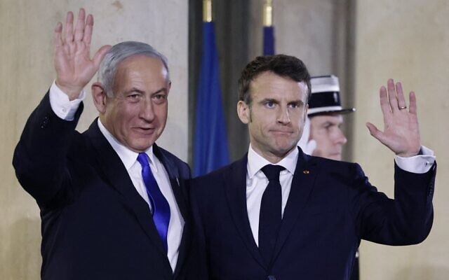 Prime Minister Benjamin Netanyahu (L) and French President Emmanuel Macron (R) gesture prior to a working dinner at the Presidential Elysee Palace in Paris on February 2, 2023. (Ludovic Marin/AFP) Prime Minister Benjamin Netanyahu (L) and French President Emmanuel Macron (R) gesture prior to a working dinner at the Presidential Elysee Palace in Paris on February 2, 2023. (Ludovic Marin/AFP)