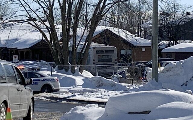 Police secure the scene where a city bus crashed into a day care center in Laval, Canada, on February 8, 2023. (Anne-Sophie THILL / AFP) Police secure the scene where a city bus crashed into a day care center in Laval, Canada, on February 8, 2023. (Anne-Sophie THILL / AFP)