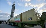 An Iranian long-range Ghadr missile with "Death to Israel" written in Hebrew down the side is displayed at a defense exhibition in city of Isfahan, central Iran, on February 8, 2023. (Morteza Salehi/Tasnim News/AFP)