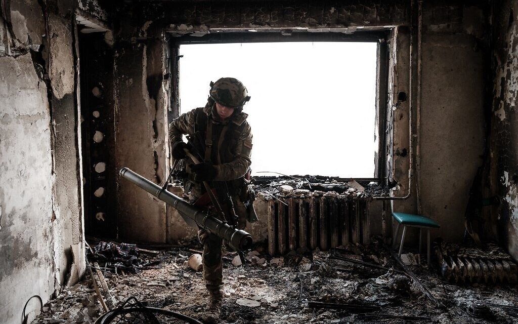 Illustrative: A Ukrainian serviceman of the State Border Guard Service works in a position in Bakhmut on February 9, 2023, amid the Russian invasion of Ukraine. (YASUYOSHI CHIBA / AFP)