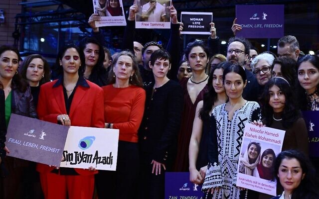 Berlinale Executive Director Mariette Rissenbeek, US actress and Berlinale Jury President Kristen Stewart, Iranian-French actress and jury member Golshifteh Farahani, and others hold placards reading "Woman Life Freedom" during a protest in solidarity with protesters in Iran, on the red carpet at the Berlinale on February 18, 2023, in Berlin. (John MacDougall/AFP) Berlinale Executive Director Mariette Rissenbeek, US actress and Berlinale Jury President Kristen Stewart, Iranian-French actress and jury member Golshifteh Farahani, and others hold placards reading "Woman Life Freedom" during a protest in solidarity with protesters in Iran, on the red carpet at the Berlinale on February 18, 2023, in Berlin. (John MacDougall/AFP)