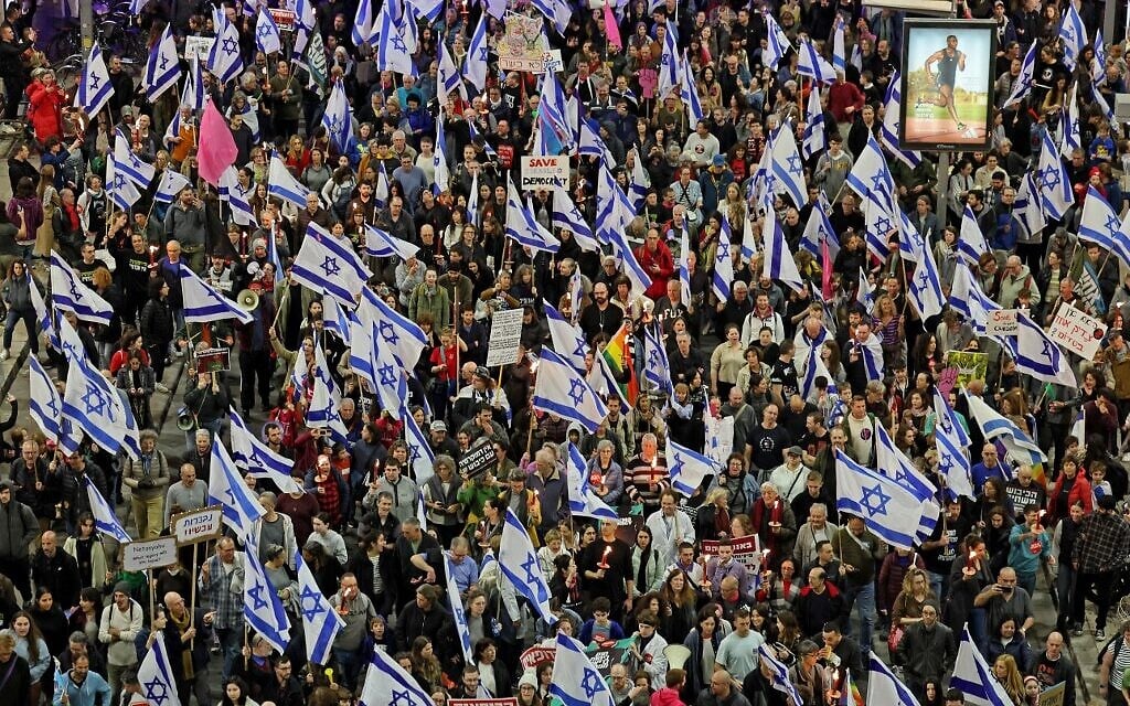 Israelis take part in protests against controversial legal overhaul being touted by the country's government, in Tel Aviv on February 25, 2023. (Jack Guez/AFP) Israelis take part in protests against controversial legal overhaul being touted by the country's government, in Tel Aviv on February 25, 2023. (Jack Guez/AFP)