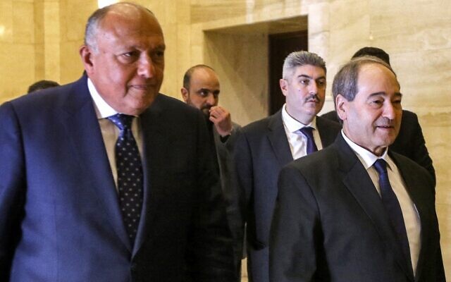 Egyptian Foreign Minister Sameh Shoukry (L) and Syrian Foreign Minister Faisal Mekdad (R) arrive for a press conference at the foreign ministry headquarters in Damascus on February 27, 2023. (Photo by LOUAI BESHARA / AFP) Egyptian Foreign Minister Sameh Shoukry (L) and Syrian Foreign Minister Faisal Mekdad (R) arrive for a press conference at the foreign ministry headquarters in Damascus on February 27, 2023. (Photo by LOUAI BESHARA / AFP)