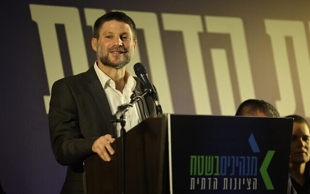 Finance Minister Bezalel Smotrich speaks at a Religious Zionism party press conference about the judicial overhaul in Jerusalem, February 19, 2023. (Yonatan Sindel/Flash90) Finance Minister Bezalel Smotrich speaks at a Religious Zionism party press conference about the judicial overhaul in Jerusalem, February 19, 2023. (Yonatan Sindel/Flash90)