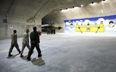 A poster inside a newly unveiled Iranian underground Air Force base. The central silhouette appears to be that of the Sukhoi Su-35 jet, which Iran does not yet have as of February 2023. (Iranian Army via Fars)