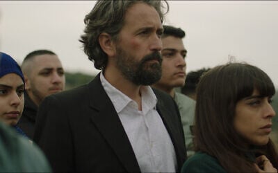 Actors Alex Bakri and Juna Suleiman in a scene from 'Let It Be Morning,' directed by Eran Kolirin. (Courtesy of Cohen Media Group via JTA)