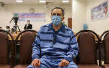 In this file photo taken on February 6, 2022, Jamshid Sharmahd, who is accused by the Iranian government of being a leader of the US-based "Tondar terrorist group" behind a deadly attack in Iran in 2008, attends the first hearing of his trial in Tehran. (Koosha MAHSHID FALAHI/MIZAN NEWS AGENCY/AFP)