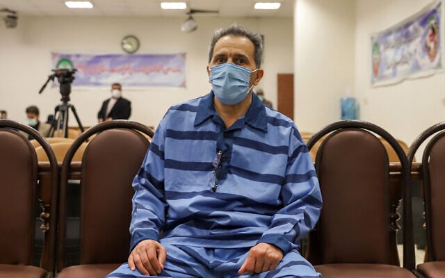 In this file photo taken on February 6, 2022, Jamshid Sharmahd, who is accused by the Iranian government of being a leader of the US-based "Tondar terrorist group" behind a deadly attack in Iran in 2008, attends the first hearing of his trial in Tehran. (Koosha MAHSHID FALAHI/MIZAN NEWS AGENCY/AFP)