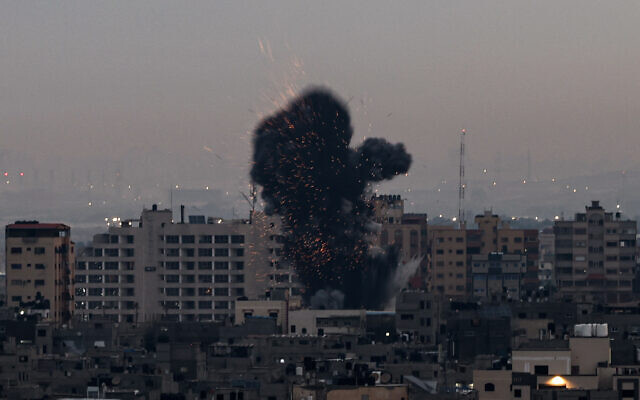 Smoke rises above buildings in Gaza City as Israel launched air strikes on the Palestinian enclave early February 23, 2023. (MOHAMMED ABED / AFP) Smoke rises above buildings in Gaza City as Israel launched air strikes on the Palestinian enclave early February 23, 2023. (MOHAMMED ABED / AFP)