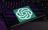 The logo for OpenAI, the maker of ChatGPT, appears on a mobile phone, in New York, January 31, 2023. (AP/Richard Drew)