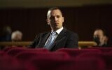 Lias Kasidiaris, a former Golden Dawn lawmaker who was found guilty along with others of leading a criminal organization and faceed 13 years in prison, looks on during a trial, in Athens, October 21, 2020. (Petros Giannakouris/AP)