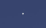 A balloon floats over Columbia, Montana on Feb. 3, 2023 (Anna Griffin/Missourian via AP)