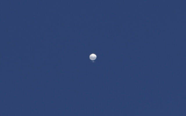 A balloon floats over Columbia, Montana on Feb. 3, 2023 (Anna Griffin/Missourian via AP) A balloon floats over Columbia, Montana on Feb. 3, 2023 (Anna Griffin/Missourian via AP)