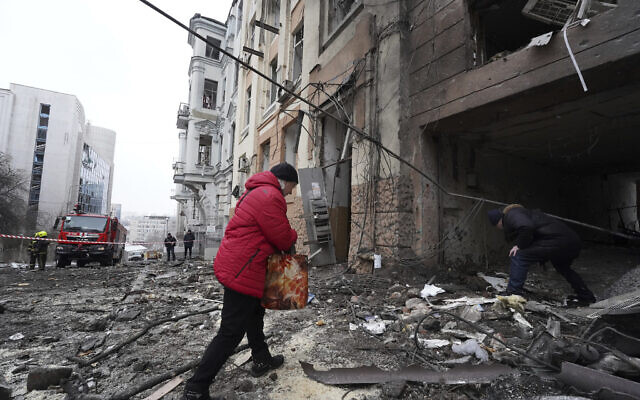 A person enters a residential building which was hit by a Russian rocket at the city center of Kharkiv, Ukraine, Sunday, Feb. 5, 2023. (AP/Andrii Marienko) A person enters a residential building which was hit by a Russian rocket at the city center of Kharkiv, Ukraine, Sunday, Feb. 5, 2023. (AP/Andrii Marienko)