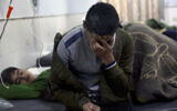 Earthquake victims receive treatment at the al-Rahma Hospital in the town of Darkush, Idlib province, northern Syria, Monday, Feb. 6, 2023. (AP Photo/Ghaith Alsayed)