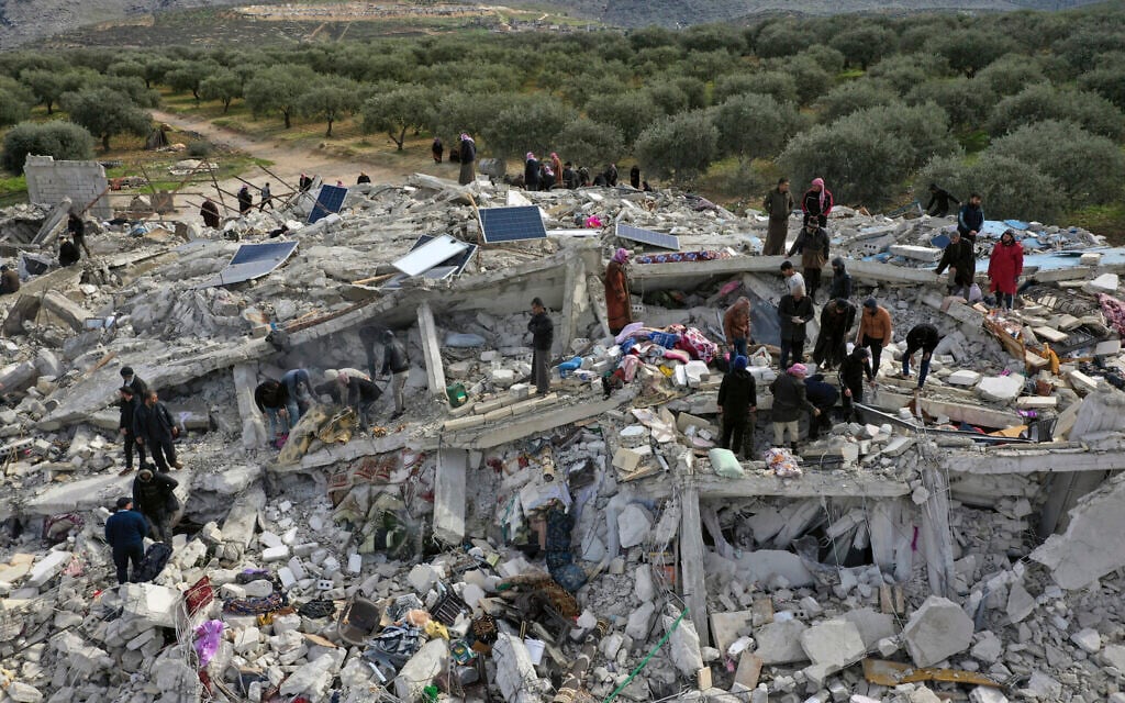 Civil defense workers and residents search through the rubble of collapsed buildings in the town of Harem near the Turkish border, Idlib province, Syria, Feb. 6, 2023 (AP Photo/Ghaith Alsayed) Civil defense workers and residents search through the rubble of collapsed buildings in the town of Harem near the Turkish border, Idlib province, Syria, Feb. 6, 2023 (AP Photo/Ghaith Alsayed)