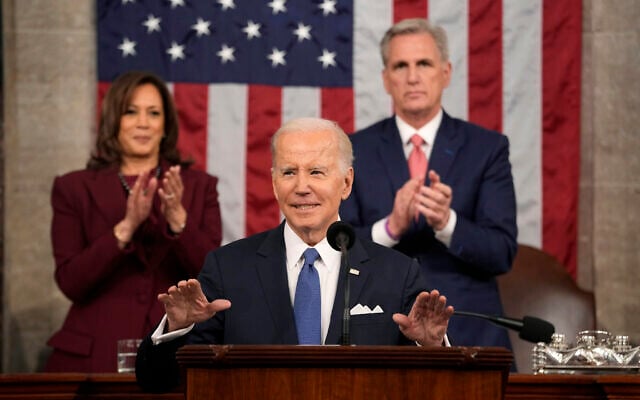 US President Joe Biden delivers the State of the Union address to a joint session of Congress at the U.S. Capitol, Tuesday, Feb. 7, 2023, in Washington, as Vice President Kamala Harris and House Speaker Kevin McCarthy of Calif., applaud. (AP/Jacquelyn Martin, Pool) US President Joe Biden delivers the State of the Union address to a joint session of Congress at the U.S. Capitol, Tuesday, Feb. 7, 2023, in Washington, as Vice President Kamala Harris and House Speaker Kevin McCarthy of Calif., applaud. (AP/Jacquelyn Martin, Pool)