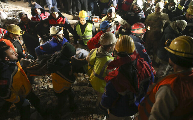 Rescue workers pull out a young woman from a collapsed building in Adiyaman, southern Turkey, Thursday, Feb. 9, 2023. (AP/Emrah Gurel) Rescue workers pull out a young woman from a collapsed building in Adiyaman, southern Turkey, Thursday, Feb. 9, 2023. (AP/Emrah Gurel)