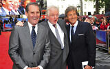 Left to right: Actor Ben Cross, British filmmaker Hugh Hudson, actor Nigel Havers appear at the Chariots of Fire Great British Premiere in London on July 10, 2012. (Jon Furniss/Invision/AP, File)