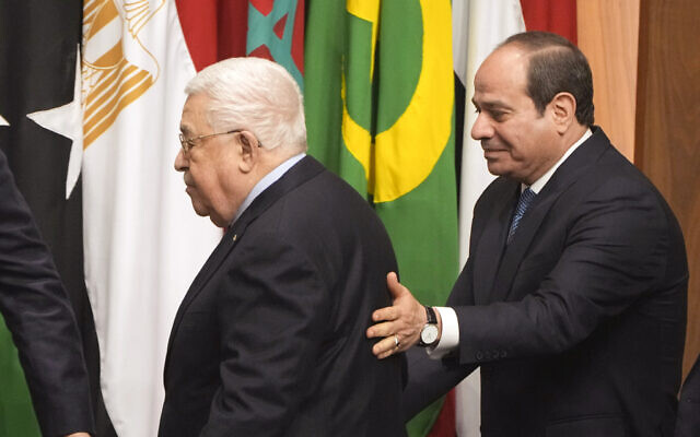 Egyptian President Abdel-Fattah el-Sissi, right, greets Palestinian Authority President Mahmoud Abbas, during a conference at the Arab League headquarters in Cairo, Egypt, Sunday, Feb. 12, 2023. (AP Photo/Amr Nabil) Egyptian President Abdel-Fattah el-Sissi, right, greets Palestinian Authority President Mahmoud Abbas, during a conference at the Arab League headquarters in Cairo, Egypt, Sunday, Feb. 12, 2023. (AP Photo/Amr Nabil)