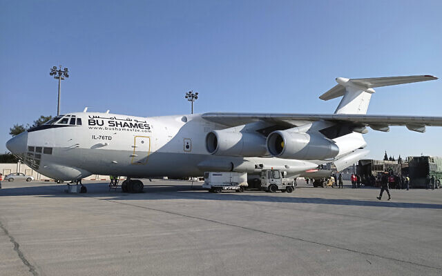 A Saudi Arabian plane carrying humanitarian aid for Syria following a devastating earthquake arrives at the airport in Aleppo, Syria, February 14, 2023. (SANA via AP)