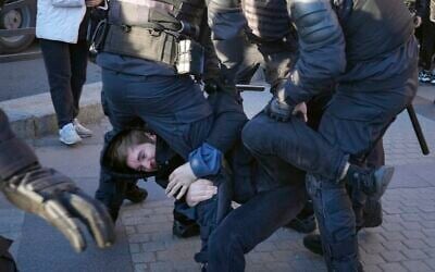 Russian police detain an antiwar protester in St. Petersburg, Russia, Saturday, September 24, 2022. (AP Photo, File)