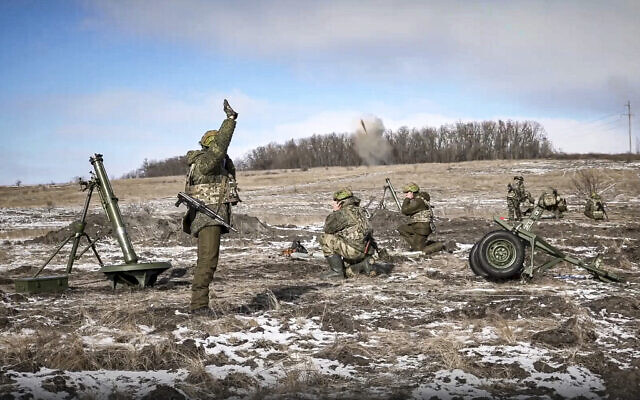 In this handout photo taken from video and released by Russian Defense Ministry Press Service on February 17, 2023, the Russian army's 120 mm mortars fire at Ukrainian troops at an undisclosed location. (Russian Defense Ministry Press Service via AP) In this handout photo taken from video and released by Russian Defense Ministry Press Service on February 17, 2023, the Russian army's 120 mm mortars fire at Ukrainian troops at an undisclosed location. (Russian Defense Ministry Press Service via AP)