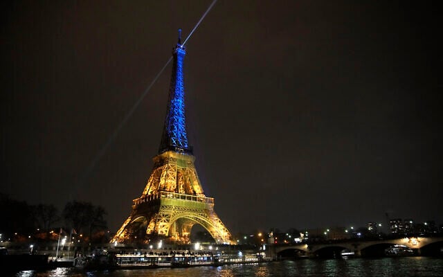 The Eiffel Tower is illuminated with the colors of Ukraine to mark the one-year anniversary of Russia's invasion of the country, in Paris, February 23, 2023. (AP Photo/Christophe Ena) The Eiffel Tower is illuminated with the colors of Ukraine to mark the one-year anniversary of Russia's invasion of the country, in Paris, February 23, 2023. (AP Photo/Christophe Ena)