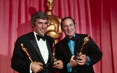 Composer Burt Bacharach, left, and lyricist Hal David hold Oscars they won for 'Raindrops Keep Falling on My Head' from 'Butch Cassidy and the Sundance Kid,' at the Academy Awards, April 7, 1970. (Bettmann/Getty Images via JTA)
