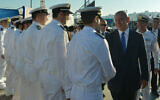 A government handout shows Israeli Prime Minister Benjamin Netanyahu greeting sailors at a welcoming ceremony for the new Rahav submarine in Haifa, on January 12, 2016. (Kobi Gideon/GPO)