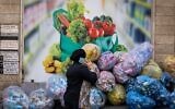 Plastic bags with bottles for recycling in Jerusalem, September 8, 2022. (Yonatan Sindel/Flash90)