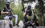 Palestinian Islamic Jihad gunmen attend the funeral of fellow member in the Jenin refugee camp on October 8, 2022.  (Nasser Ishtayeh/Flash90)